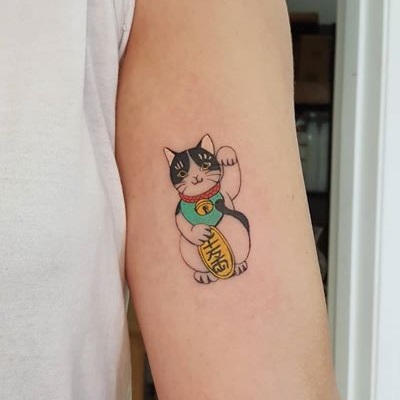 tatuagem gato da sorte