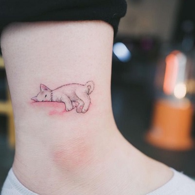 tatuagem de gato dormindo